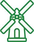 Grüne Windmühle mit vier Flügeln und einem stabilen Sockel.