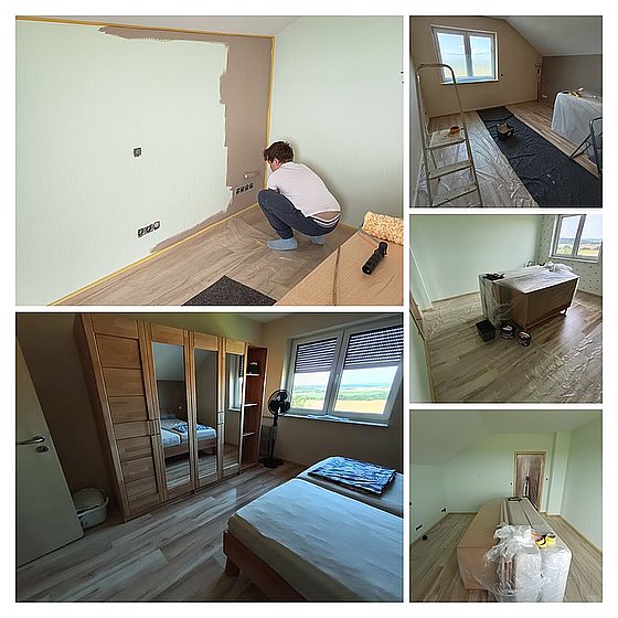 Person beim Streichen eines Raumes, unimmbauter Wohnbereich mit Möbeln und Fenstern.