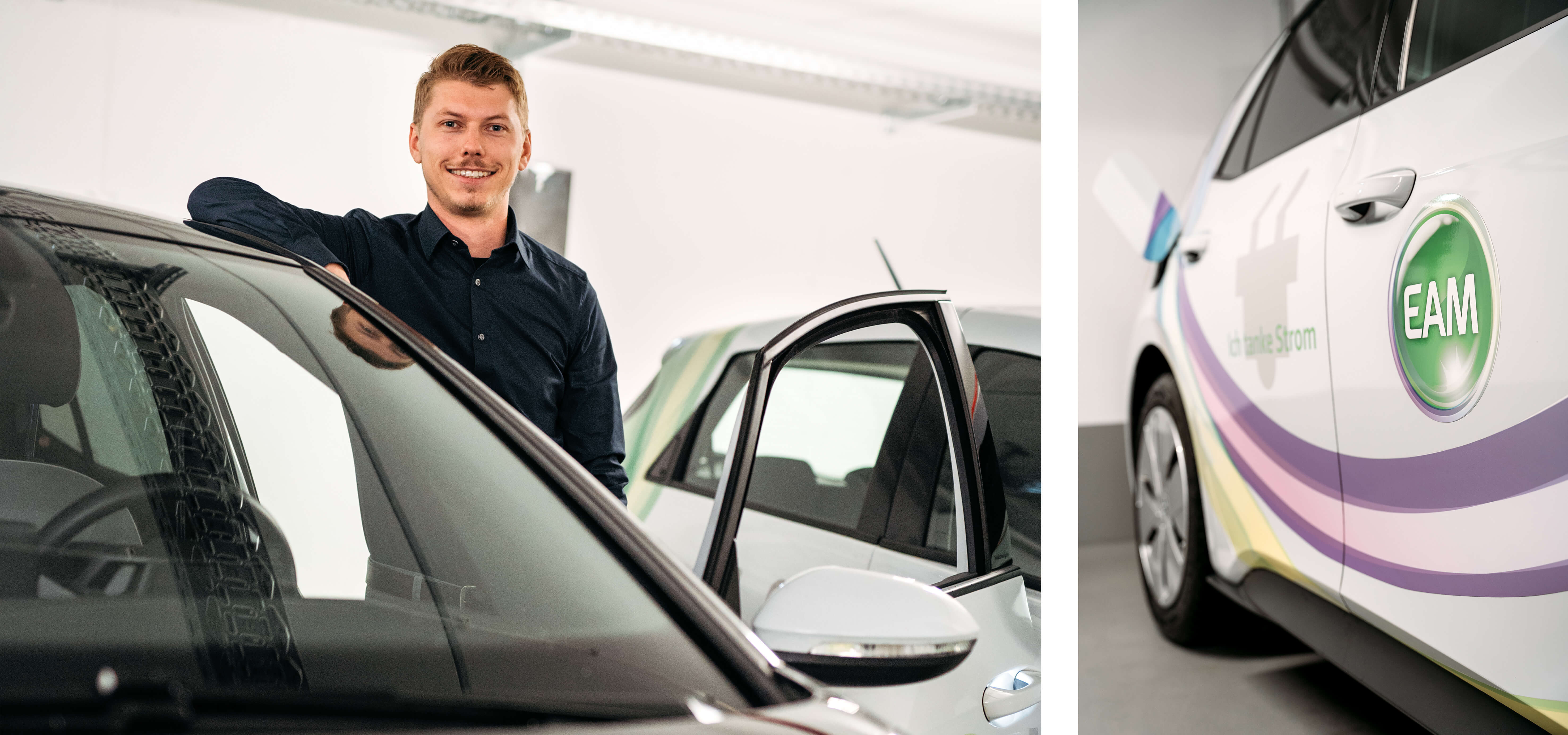 Mann steht an einem schwarzen Auto, das Fahrzeug ist zur Halterung einer weißen Elektroauto-Ladestation gerichtet.
