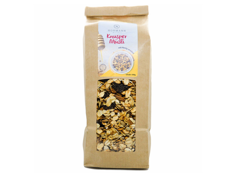 Verpackung von Hohmann Knusper Müslimischung mit Honig, 500g, in einem transparenten Beutel.